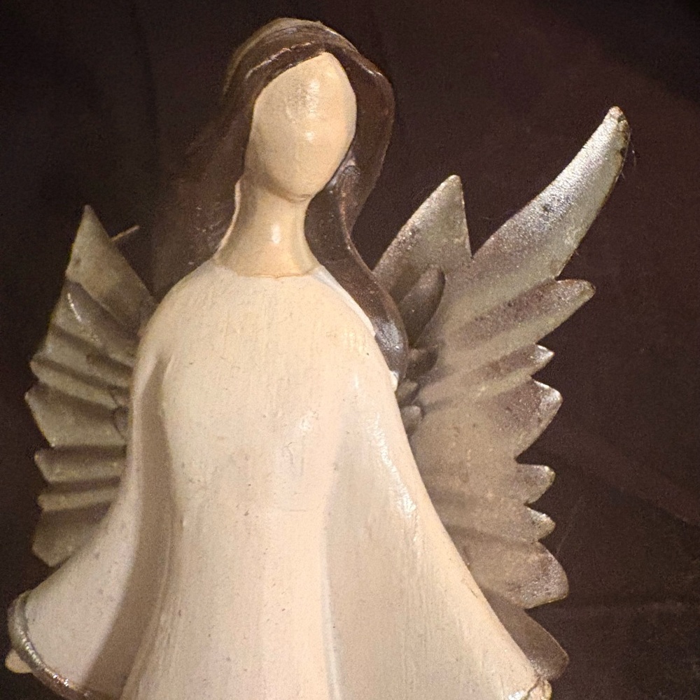 Serene Angel statue approximately 6” perfect condition